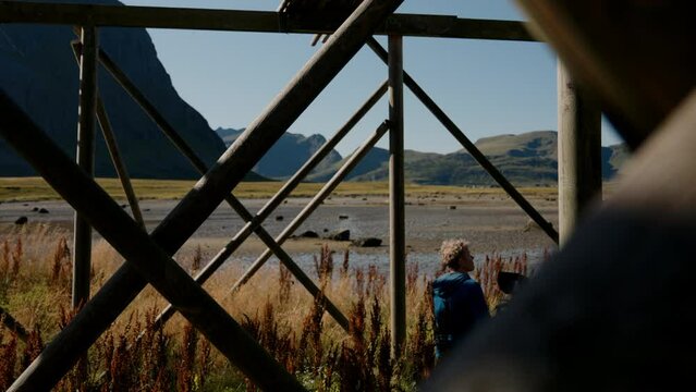 Man In Blue Hoodie Recording Stockfish Rack
