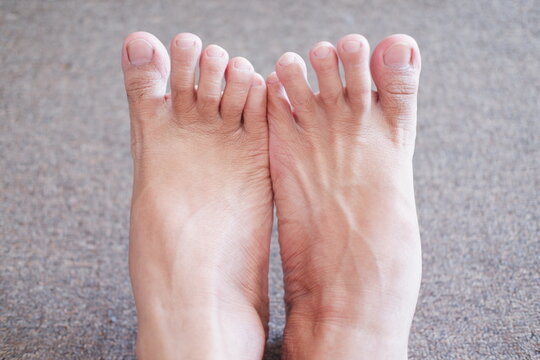 Close up of human foot on the floor, shallow depth of field