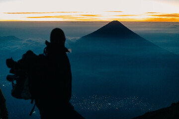 guatemala - may 12th 2023 people on Volcano Acatenango in the morning - obrazy, fototapety, plakaty