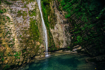 dried waterfall. small trickle of water