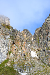 Sunny snow and mountain landscape in Hamilton Bay, Rand Fjord, Svalbard, Arctic

