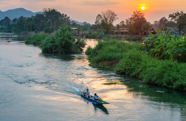 Sunset view from Don Det-Don Khon historic railway bridge,crossing the Mekong river the 4000 Islands,Champasak Province of southern Laos. - obrazy, fototapety, plakaty