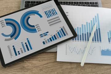 KPI Business Analytics Finance graph chart report on the tablet screen.Data Analytics Statistics Information Business Technology