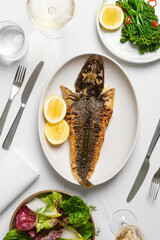Whole fish served at modern restaurant.