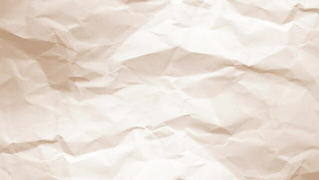 Crumpled white paper sheet seamless texture, copy space, motion graphic. background animation white crumpled paper stop motion.