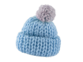 knitted hat made of wool yarn with a gray pompom, isolated on a white background