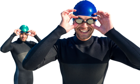 Digital png photo of two caucasian male swimmers putting swimming googles on transparent background