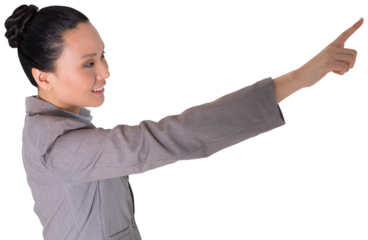 Digital png photo of happy biracial businesswoman pointing on transparent background