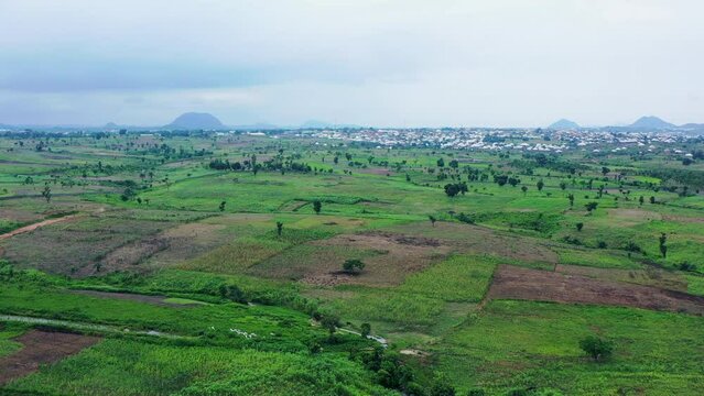 Nigerian Kuje 3 countryside farmland or estate land - ascending aerial view