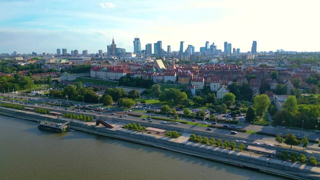 Aerial panorama of Warsaw, Poland over the Vistual river and City center in a distance Old town. Downtown skyscrapers cityscape. Business