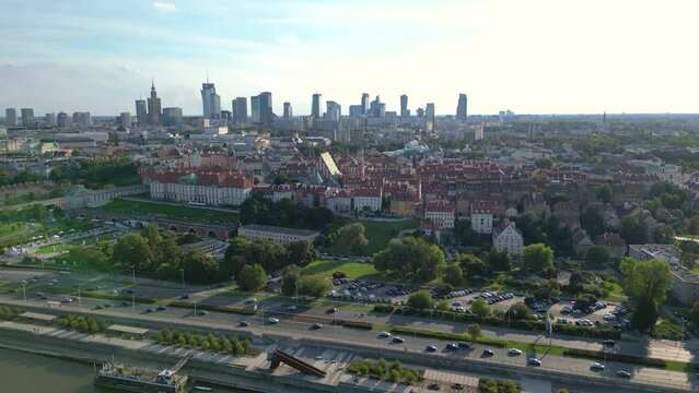 Aerial panorama of Warsaw, Poland over the Vistual river and City center in a distance Old town. Downtown skyscrapers cityscape. Business