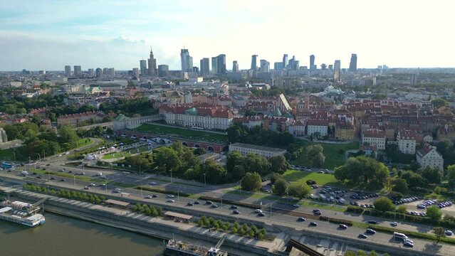Aerial panorama of Warsaw, Poland over the Vistual river and City center in a distance Old town. Downtown skyscrapers cityscape. Business