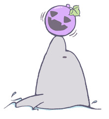 カボチャボールを口先に乗せるイルカ