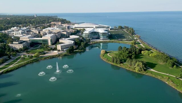 High resolution beautiful panoramic drone aerial 4K video of the famous Northwestern University and Kellogg School of Management Campus in Evanston IL during a beautiful summer day