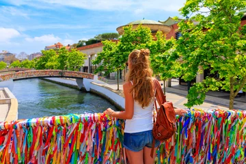 Poster Woman tourist enjoying city and canal in Aveiro- travel, tour tourism in Portugal © M.studio