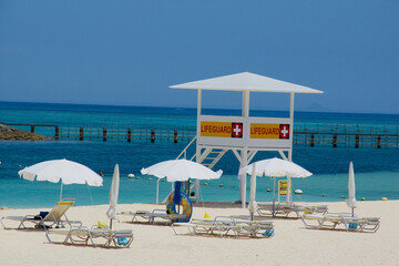 beach umbrellas and chairs on the beach