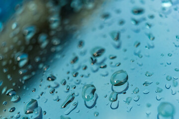 Rain drops on car windshield. - 667490105