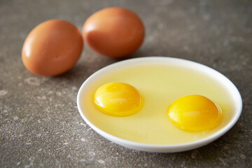 Fresh eggs and yolks