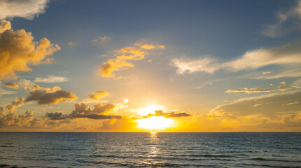 Sea beach with sky sunset or sunrise. Cloudscape over the sunset sea. Sunset at tropical beach. Nature sunset landscape of evening sea.