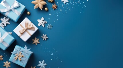 Christmas composition ornaments winter gift box on blue background top view. copy text space. for template, presentation. advertisement, banner, card.