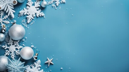 Fototapeta premium Christmas composition ornaments winter gift on blue background top view. copy text space. for template, presentation. advertisement, banner, card.