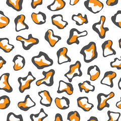 Seamless abstract pattern with black and orange spots of different shapes for textures, textiles and simple backgrounds