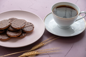 cup of coffee with cookies
