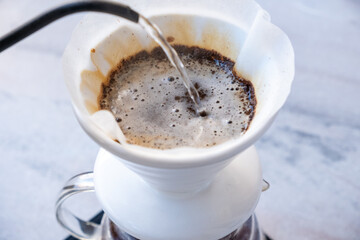 brewing coffee with the v60 method 

