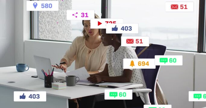 Animation of multiple notification bars over diverse female coworkers discussing reports on laptop