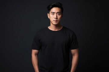 Fototapeta premium Asian man in black T-shirt