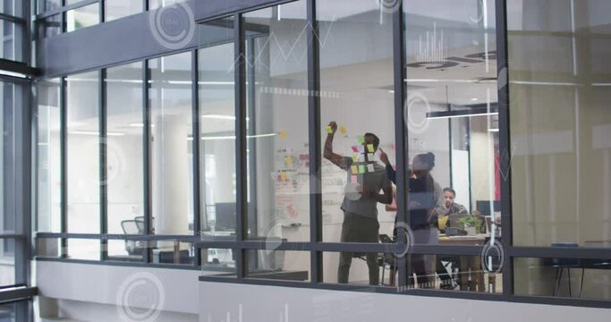 Animation of loading bars and circles over diverse coworkers discussing strategy on sticky notes