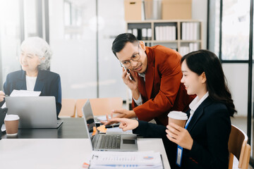  Young business creative team are brainstorming planning discussing while sitting in creative business discussing work in the modern office