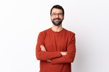 Caucasian handsome man with beard over isolated white background keeping the arms crossed in frontal position - obrazy, fototapety, plakaty