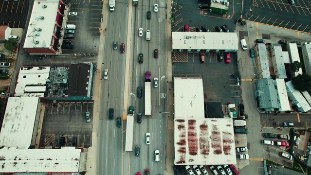 Establishing aerial for logistics trucking business. Grat concept for hiring CDL truck drivers, owner operators, fleet manager. Semi tractors pulling white trailers. Dry van - reefer. Chicago Illinois