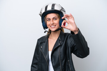 Young caucasian woman with a motorcycle helmet isolated on white background showing ok sign with fingers