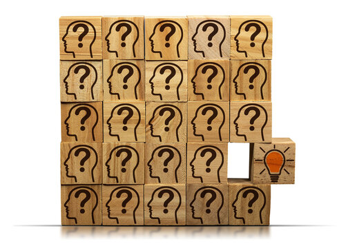 Concept of creative idea and innovation. Wooden blocks with many symbols with human heads and question marks and a wooden cube with a light bulb, isolated on white or transparent background. Png.