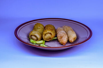 Molen and risol on a plate are one of the traditional Indonesian snacks.