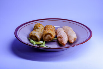 Molen and risol on a plate are one of the traditional Indonesian snacks.