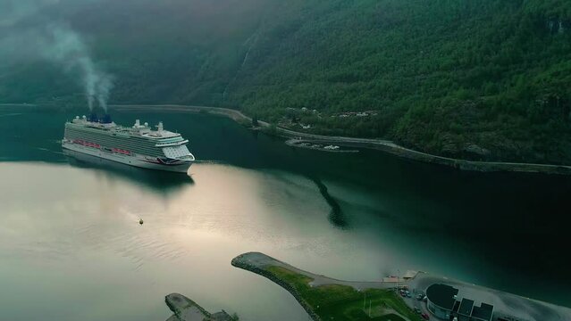 Huge cruise ship passing through the Norway flam