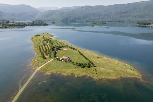 Aerial view of an Island on Ramsko Jezero (Rama lake), Prozor, Bosnia and Herzegovina.