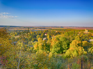 Fototapeta premium Perfect landscape view before the sunset. Warm sunny light and perfect clouds made a beautiful mood
