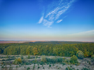 Fototapeta premium Perfect landscape view before the sunset. Warm sunny light and perfect clouds made a beautiful mood