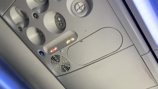 airplane overhead ai r and call button