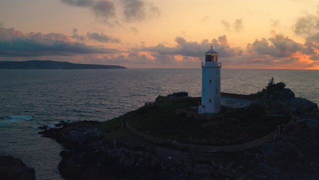 Lighthouse Godrevy in Cornwall at sunset