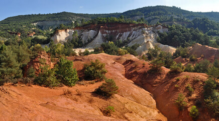 Colorado de Rustrel geological area of red rocks in the south of France. Rocky landscape with red...