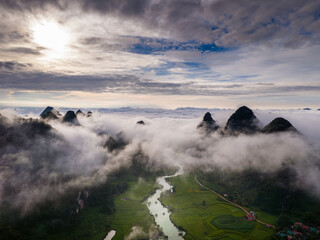Aerial landscape in Phong Nam valley, an extreme scenery landscape at Cao bang province, Vietnam with river, nature, green rice fields