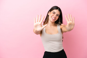 Young Italian woman isolated on pink background counting ten with fingers - obrazy, fototapety, plakaty