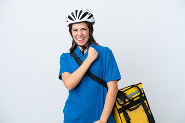 Young delivery woman with thermal backpack isolated on white background celebrating a victory
