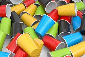 Heap of pastic disposable party cup for juice, fresh, beer on white background.