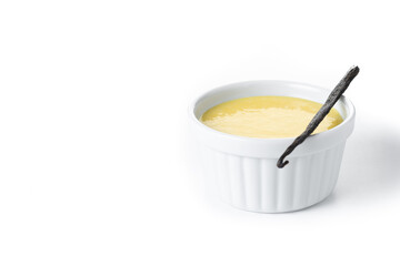 Homemade vanilla custard isolated on white background. Copy space
